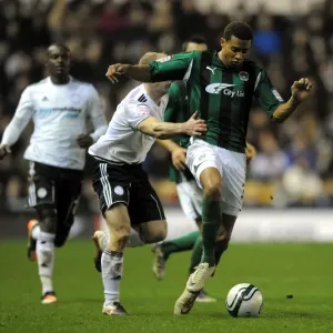 Cyrus Christie Evades Gareth Roberts: Coventry City vs. Derby County Npower Championship Showdown at Pride Park Cyrus Christie Evades Gareth Roberts: Coventry City vs. Derby County Npower Championship Showdown at Pride Park