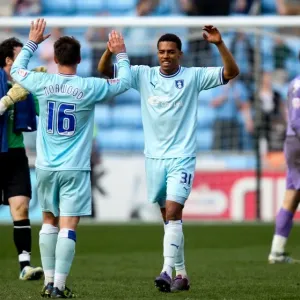 Cyrus Christie and Oliver Norwood: Coventry City's Championship Celebration (24-03-2012 vs Portsmouth) Cyrus Christie and Oliver Norwood: Coventry City's Championship Celebration (24-03-2012 vs Portsmouth)