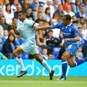 Cyrus Christie vs Jean Beausejour: Tense Moment in Birmingham City vs Coventry City Football Match