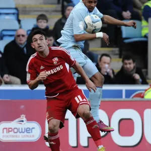 Cyrus Christie Wins the Ball: Coventry City vs Swindon Town in Npower League One at Ricoh Arena Cyrus Christie Wins the Ball: Coventry City vs Swindon Town in Npower League One at Ricoh Arena