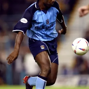 Determined Dele Adebola: Coventry City's Battle Against Nottingham Forest (2003) Determined Dele Adebola: Coventry City's Battle Against Nottingham Forest (2003)