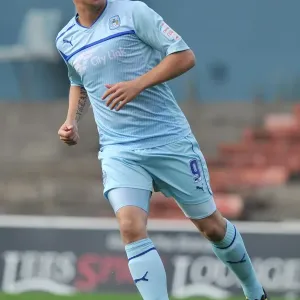 Determined Strike: Cody McDonald Scores for Coventry City Against Oldham Athletic in Football League One at Boundary Park Determined Strike: Cody McDonald Scores for Coventry City Against Oldham Athletic in Football League One at Boundary Park