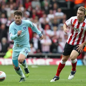 Escaping the Pressure: Norwood Evades Lambert in Coventry City vs Southampton Clash Escaping the Pressure: Norwood Evades Lambert in Coventry City vs Southampton Clash