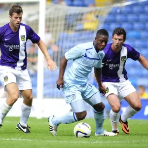 Friendly Rivalry: Jake Wright vs. Franck Moussa Clash at Kassam Stadium (Oxford United vs. Coventry City, 27-07-2013) Friendly Rivalry: Jake Wright vs. Franck Moussa Clash at Kassam Stadium (Oxford United vs. Coventry City, 27-07-2013)