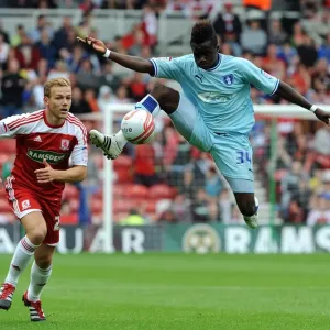 Gael Bigirimana Soars High: Coventry City vs Middlesbrough in Championship Action Gael Bigirimana Soars High: Coventry City vs Middlesbrough in Championship Action