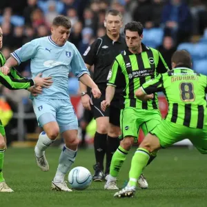 Gary Deegan's Determined Attempt to Penetrate Brighton's Defence in Coventry City vs Brighton Npower Championship Match Gary Deegan's Determined Attempt to Penetrate Brighton's Defence in Coventry City vs Brighton Npower Championship Match