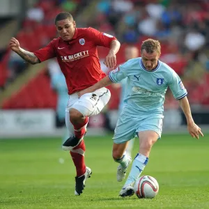 Gary McSheffrey vs. Nathan Doyle: Intense Battle for Ball Possession in Coventry City's Npower Championship Clash at Barnsley's Oakwell Stadium Gary McSheffrey vs. Nathan Doyle: Intense Battle for Ball Possession in Coventry City's Npower Championship Clash at Barnsley's Oakwell Stadium