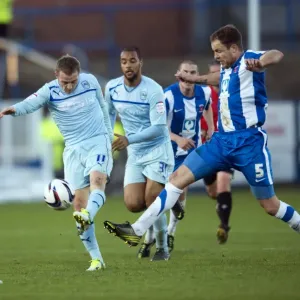 Gary McSheffrey's Tense Shot Under Pressure from Hartlepool United's Sam Collins (Coventry City vs Hartlepool United, Football League One, Victoria Park, 17-11-2012) Gary McSheffrey's Tense Shot Under Pressure from Hartlepool United's Sam Collins (Coventry City vs Hartlepool United, Football League One, Victoria Park, 17-11-2012)