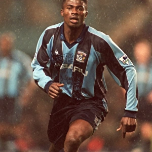 George Boateng Stands Firm Against Manchester United: A Tense Moment in Coventry City's FA Carling Premiership (December 1997)