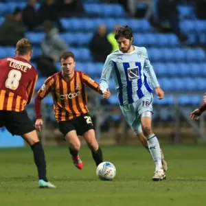Intense Action: Coventry City's Adam Barton Faces Off Against Bradford City Opponents in Sky Bet League One Intense Action: Coventry City's Adam Barton Faces Off Against Bradford City Opponents in Sky Bet League One