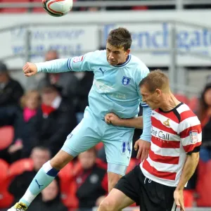 Intense Aerial Battle: Coventry City vs. Burnley - Cody McDonald vs. Richard Naylor Intense Aerial Battle: Coventry City vs. Burnley - Cody McDonald vs. Richard Naylor
