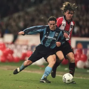 Intense Battle for the Ball: Paul Telfer vs. Wayne Quinn (FA Cup Quarterfinal Replay: Sheffield United vs. Coventry City) Intense Battle for the Ball: Paul Telfer vs. Wayne Quinn (FA Cup Quarterfinal Replay: Sheffield United vs. Coventry City)