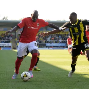 Intense Battle: Binnom-Williams vs. Fortune - Sky Bet League One Tackle Showdown between Burton Albion and Coventry City Intense Battle: Binnom-Williams vs. Fortune - Sky Bet League One Tackle Showdown between Burton Albion and Coventry City