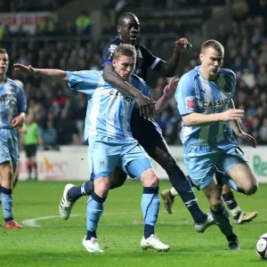 Intense Battle: Chris Samba vs. Ben Turner and Elliott Ward - Coventry City vs. Blackburn Rovers, FA Cup Fifth Round Replay Intense Battle: Chris Samba vs. Ben Turner and Elliott Ward - Coventry City vs. Blackburn Rovers, FA Cup Fifth Round Replay