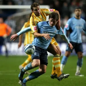 Intense Battle for Possession: Coventry City vs Newcastle United (Championship Clash at Ricoh Arena, 09-12-2009) Intense Battle for Possession: Coventry City vs Newcastle United (Championship Clash at Ricoh Arena, 09-12-2009)