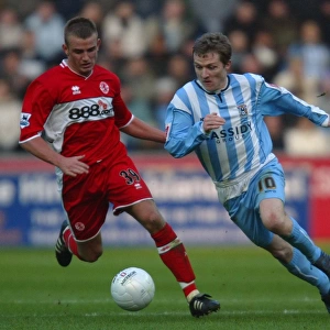 Intense FA Cup Showdown: McSheffrey vs. Cattermole's Battle for Ball Possession (Coventry City vs. Middlesbrough, 2006, Round 4)