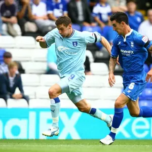 Intense Moment: A Face-Off Between Lukas Jutkiewicz and Liam Ridgewell in the Football League Championship