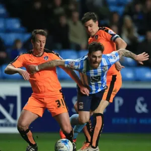 Intense Moment: Romain Vincelot of Coventry City Charges Forward Against Nicky Shorey and Owen Garvan of Colchester United at Ricoh Arena Intense Moment: Romain Vincelot of Coventry City Charges Forward Against Nicky Shorey and Owen Garvan of Colchester United at Ricoh Arena