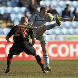 Intense Rivalry: Baker vs. Bidwell in Coventry City vs. Brentford Football Match Intense Rivalry: Baker vs. Bidwell in Coventry City vs. Brentford Football Match