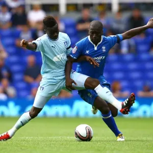 Intense Rivalry: Bigirimana vs. Gomis - The Battle for Ball Supremacy between Coventry City and Birmingham City
