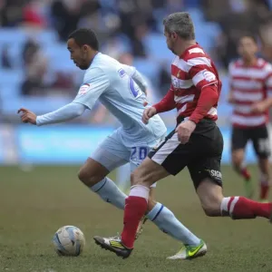 Intense Rivalry: Callum Wilson vs. Andy Griffin - Coventry City vs. Doncaster Rovers, Npower League One at Ricoh Arena Intense Rivalry: Callum Wilson vs. Andy Griffin - Coventry City vs. Doncaster Rovers, Npower League One at Ricoh Arena