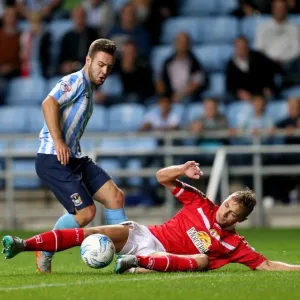 Intense Rivalry: Coventry City vs Crewe Alexandra - A Battle for Possession in Sky Bet League One
