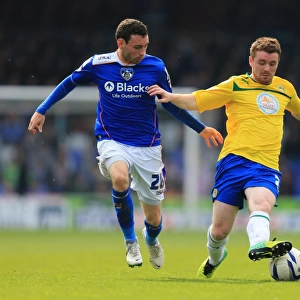 Intense Rivalry: David Worrall vs John Fleck Clash in Oldham Athletic vs Coventry City Football Match, Sky Bet League One (April 21, 2014)