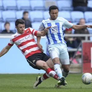Intense Rivalry: Enda Stevens vs Grant Ward Clash in Coventry City vs Doncaster Rovers League One Match Intense Rivalry: Enda Stevens vs Grant Ward Clash in Coventry City vs Doncaster Rovers League One Match