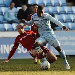 Intense Rivalry: Franck Moussa vs. Alan McCormack's Fierce Tackle in Coventry City vs. Swindon Town (Npower League One, 02-03-2013) Intense Rivalry: Franck Moussa vs. Alan McCormack's Fierce Tackle in Coventry City vs. Swindon Town (Npower League One, 02-03-2013)