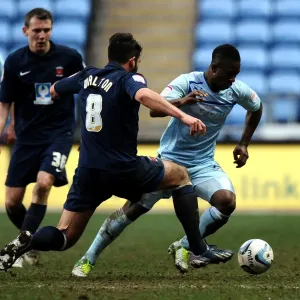 Intense Rivalry: Franck Moussa vs. Simon Walton - Coventry City vs. Hartlepool United Npower League One Clash at Ricoh Arena Intense Rivalry: Franck Moussa vs. Simon Walton - Coventry City vs. Hartlepool United Npower League One Clash at Ricoh Arena