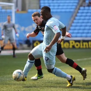 Intense Rivalry: Franck Moussa vs. Lee Hodson in Coventry City vs. Brentford Football League One Clash Intense Rivalry: Franck Moussa vs. Lee Hodson in Coventry City vs. Brentford Football League One Clash