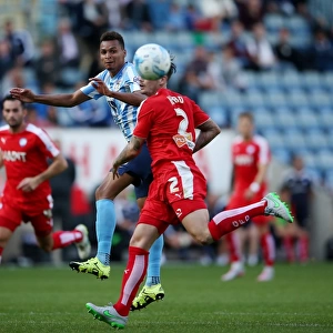 Intense Rivalry: Jacob Murphy vs. Chris Hird in Coventry City's Sky Bet League One Battle Against Chesterfield