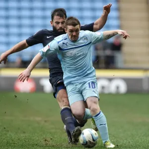 Intense Rivalry: John Fleck vs. Simon Walton's Hard-Fought Tackle in Coventry City vs. Hartlepool United Npower League One Clash Intense Rivalry: John Fleck vs. Simon Walton's Hard-Fought Tackle in Coventry City vs. Hartlepool United Npower League One Clash