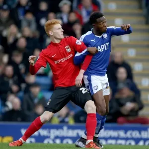 Intense Rivalry: Jordan Willis vs. Gboly Ariyibi in Coventry City's League One Battle at Chesterfield Intense Rivalry: Jordan Willis vs. Gboly Ariyibi in Coventry City's League One Battle at Chesterfield