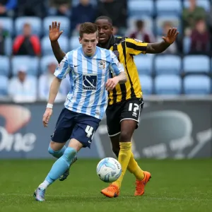 Intense Rivalry: Kent vs Ogogo's Battle for Possession in Coventry City vs Shrewsbury Town (Sky Bet League One) Intense Rivalry: Kent vs Ogogo's Battle for Possession in Coventry City vs Shrewsbury Town (Sky Bet League One)