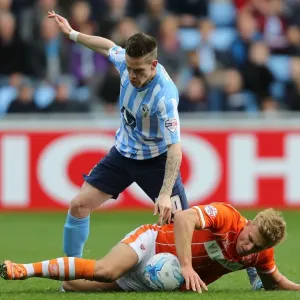 Intense Rivalry: Kent vs. Potts Battle in Coventry City vs. Blackpool Football Match, Sky Bet League One, Ricoh Arena Intense Rivalry: Kent vs. Potts Battle in Coventry City vs. Blackpool Football Match, Sky Bet League One, Ricoh Arena