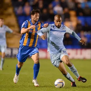 Intense Rivalry: McGoldrick vs Jacobson's Battle for Ball in Coventry City's Npower League One Clash (September 18, 2012) Intense Rivalry: McGoldrick vs Jacobson's Battle for Ball in Coventry City's Npower League One Clash (September 18, 2012)