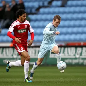 Intense Rivalry: McSheffrey vs. Haroun Battle for Ball Supremacy (Coventry City vs. Middlesbrough, Npower Championship, 21-01-2012) Intense Rivalry: McSheffrey vs. Haroun Battle for Ball Supremacy (Coventry City vs. Middlesbrough, Npower Championship, 21-01-2012)