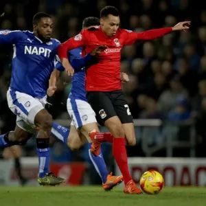 Intense Rivalry: Murphy vs Ebanks-Blake's Fierce Tackle in Coventry City's League One Clash at Chesterfield Intense Rivalry: Murphy vs Ebanks-Blake's Fierce Tackle in Coventry City's League One Clash at Chesterfield