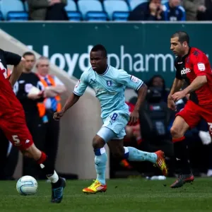 Intense Rivalry: Nimely Chases Down Pearce and Ben Haim, Coventry City vs Portsmouth (24-03-2012) Intense Rivalry: Nimely Chases Down Pearce and Ben Haim, Coventry City vs Portsmouth (24-03-2012)