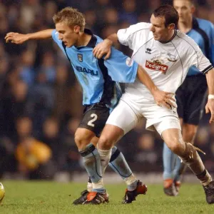 Intense Rivalry: Pead vs. Burley Clash in Coventry City vs. Derby County (Nationwide League Division One, 21-12-2002) Intense Rivalry: Pead vs. Burley Clash in Coventry City vs. Derby County (Nationwide League Division One, 21-12-2002)