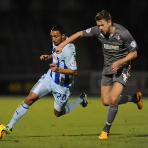 Intense Rivalry: Wilson vs Arnason's Battle for Possession in Coventry City vs Rotherham United (Sky Bet League One)