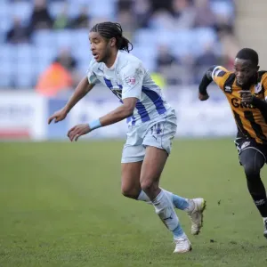 Intense Tackle: Dominic Samuel vs Mark Marshall in Coventry City vs Port Vale Sky Bet League One Match Intense Tackle: Dominic Samuel vs Mark Marshall in Coventry City vs Port Vale Sky Bet League One Match