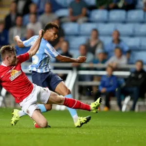 Jacob Murphy's Shot vs. Oliver Turton's Tackle: A Sky Bet League One Moment at Coventry City's Ricoh Arena