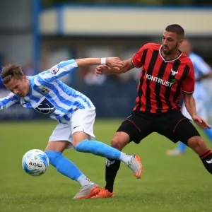 James Maddison Evasively Dodges Liam Secombe's Tackle in Coventry City's Pre-Season Friendly against Oxford United James Maddison Evasively Dodges Liam Secombe's Tackle in Coventry City's Pre-Season Friendly against Oxford United