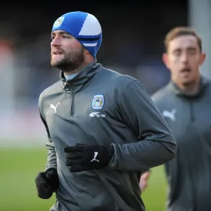 James McPake Faces Off Against Peterborough United in Coventry City's Championship Clash at London Road (17-12-2011)