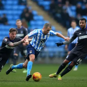 Joe Cole Battles Past Bury Defenders in Coventry City's League One Clash Joe Cole Battles Past Bury Defenders in Coventry City's League One Clash
