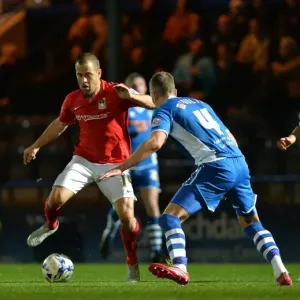 Joe Cole vs Jim McNulty: A Battle for Possession in Coventry City's Sky Bet League One Clash at Rochdale's Spotland Stadium Joe Cole vs Jim McNulty: A Battle for Possession in Coventry City's Sky Bet League One Clash at Rochdale's Spotland Stadium