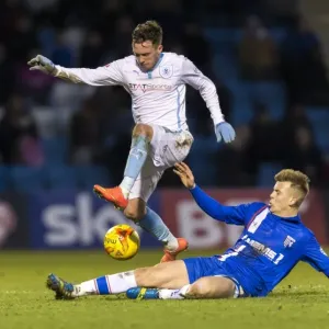 Leap of Determination: Danny Swanson Evasions Jake Hessenthaler in Coventry's League One Battle Leap of Determination: Danny Swanson Evasions Jake Hessenthaler in Coventry's League One Battle