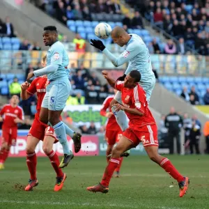 Leon Clarke Wins the Ball: Coventry City vs Swindon Town, Npower League One, Ricoh Arena Leon Clarke Wins the Ball: Coventry City vs Swindon Town, Npower League One, Ricoh Arena